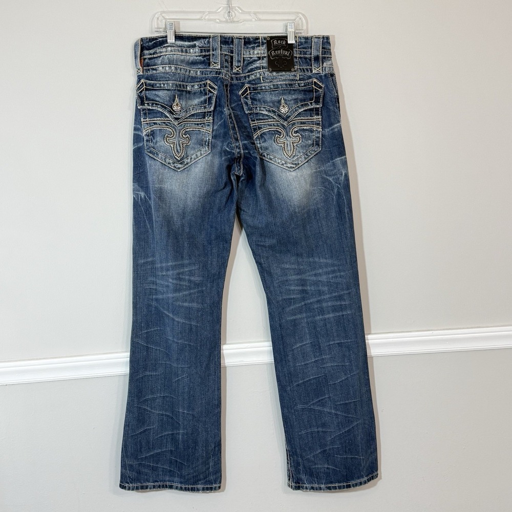 Rock Revival Roger Boot Cut Jeans Mens 34X32 Distressed Flap Pockets Studded